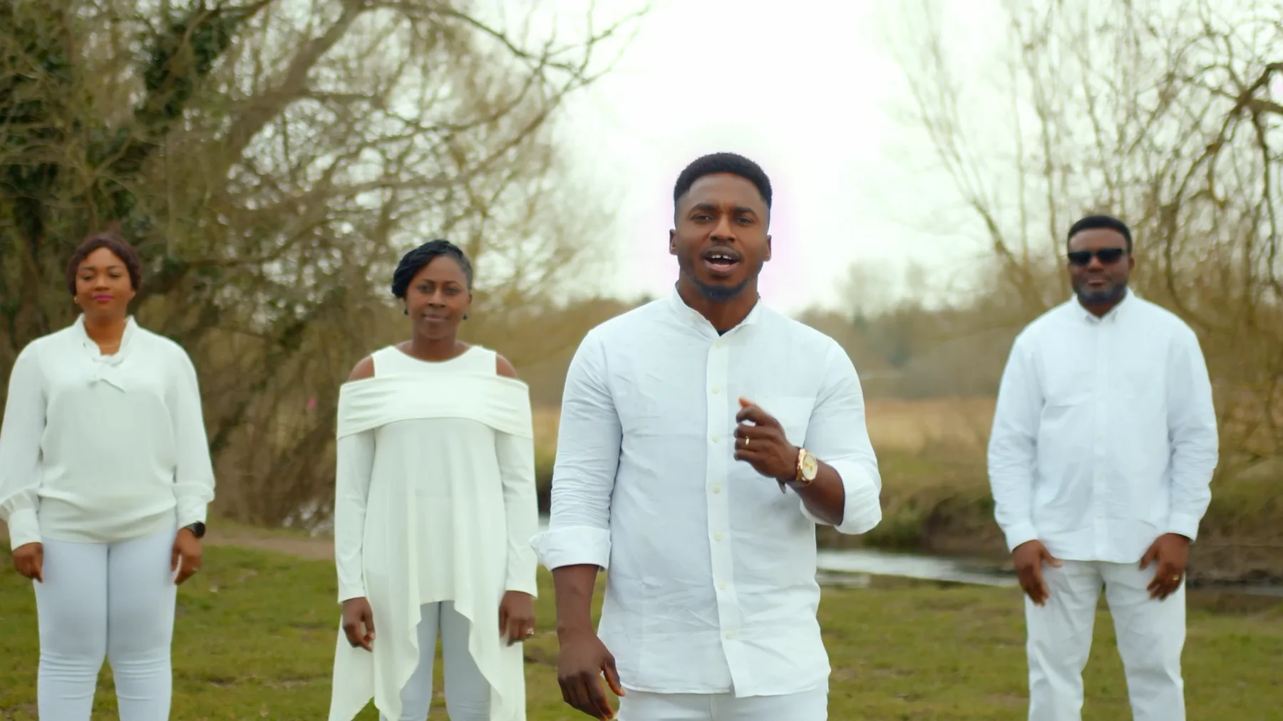 John Great and worshippers in the Yahweh official video